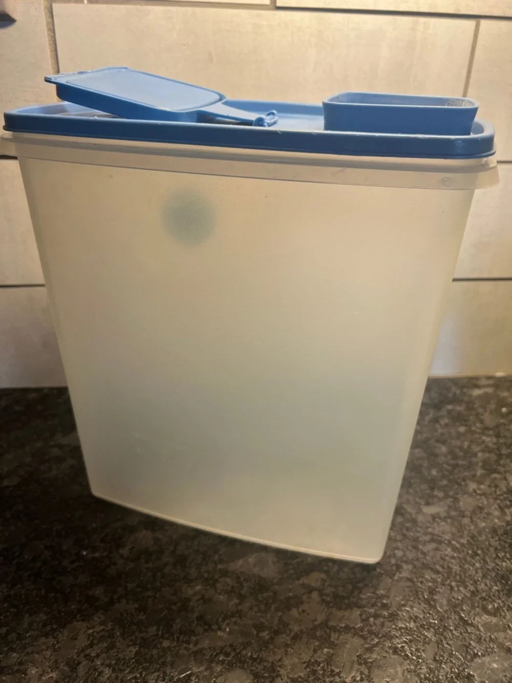 Vintage Tupperware Pour N Store Airtight Cereal Container. Blue lid. 10” tall.